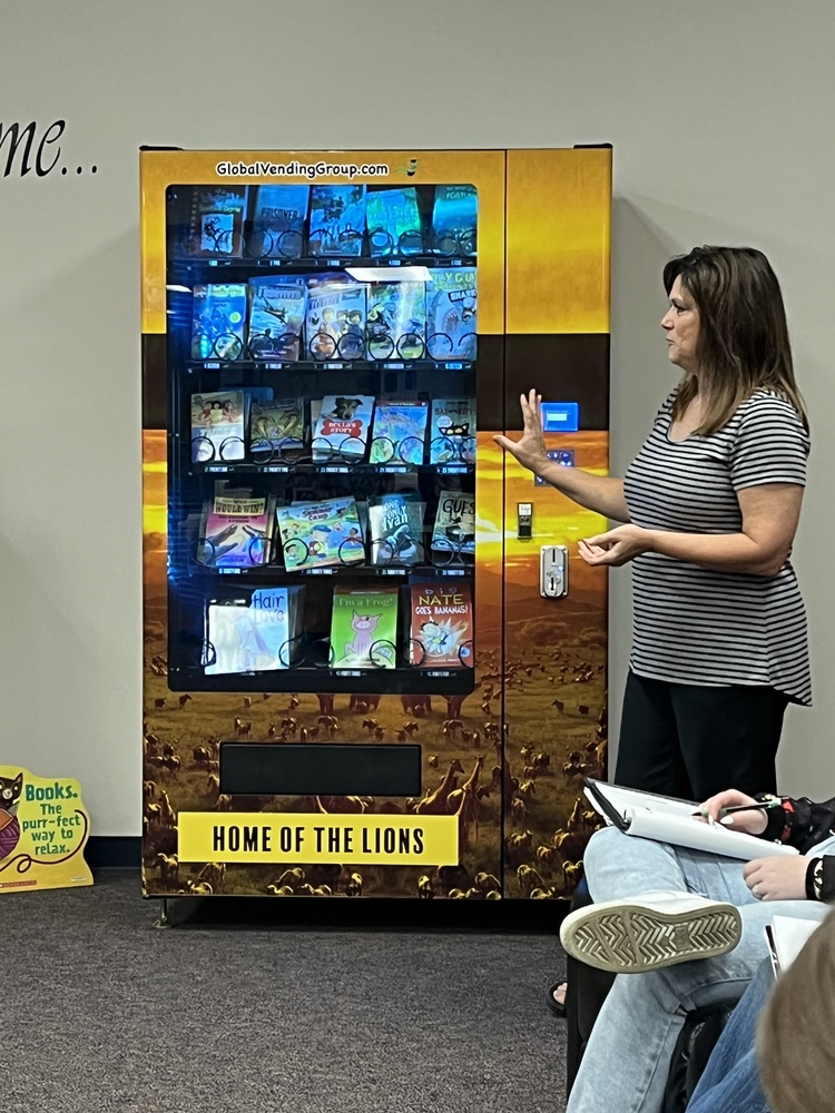 Librarian Jamie Malloy with Book Vending Machine
