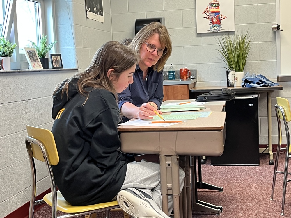 Mrs. Mahuron working with students